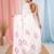 White linen saree with pink bird & texture motifs and zari borders