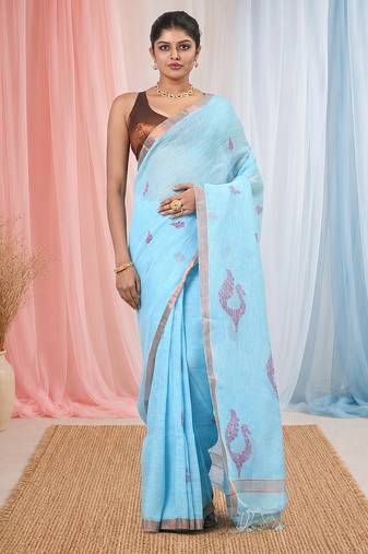 Sky blue linen saree with pink bird & texture motifs and zari borders