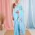 Sky blue linen saree with pink bird & texture motifs and zari borders