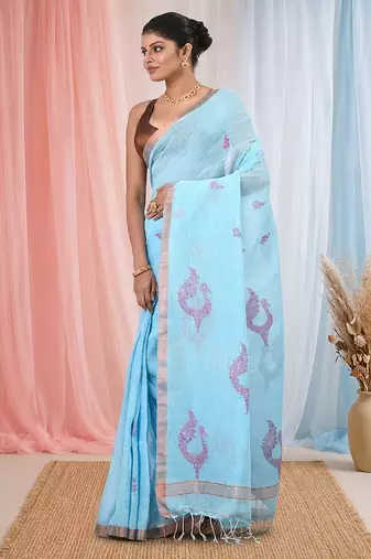 Sky blue linen saree with pink bird & texture motifs and zari borders