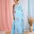 Sky blue linen saree with pink bird & texture motifs and zari borders