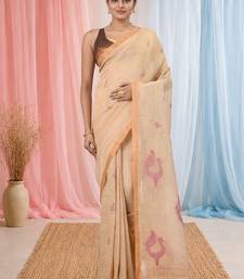 Beige linen saree with pink bird & texture motifs and zari borders