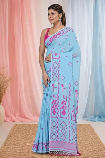 sky blue cotton blend saree with traditional woven patterns and tassel border