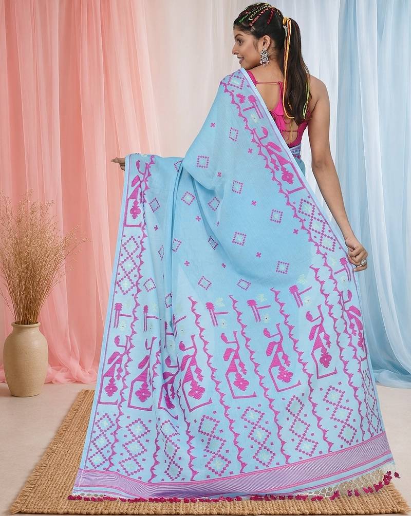 sky blue cotton blend saree with traditional woven patterns and tassel border