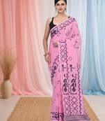 pink cotton blend saree with traditional woven patterns and tassel border