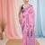 pink cotton blend saree with traditional woven patterns and tassel border