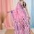 pink cotton blend saree with traditional woven patterns and tassel border