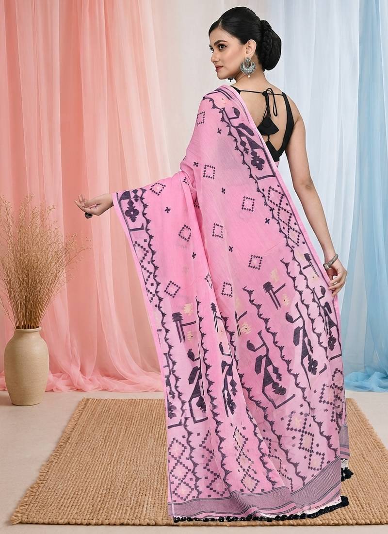 pink cotton blend saree with traditional woven patterns and tassel border