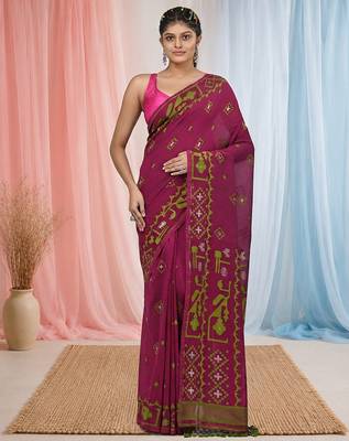 magenta cotton blend saree with traditional woven patterns and tassel border 1