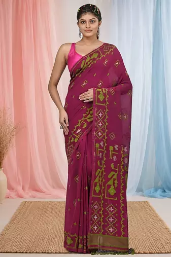 magenta cotton blend saree with traditional woven patterns and tassel border