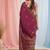 magenta cotton blend saree with traditional woven patterns and tassel border