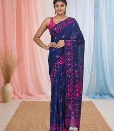 blue cotton blend saree with traditional woven patterns and tassel border