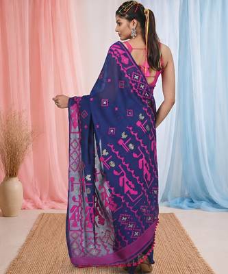 blue cotton blend saree with traditional woven patterns and tassel border 3