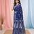 navy blue cotton blend saree with traditional woven patterns and tassel border