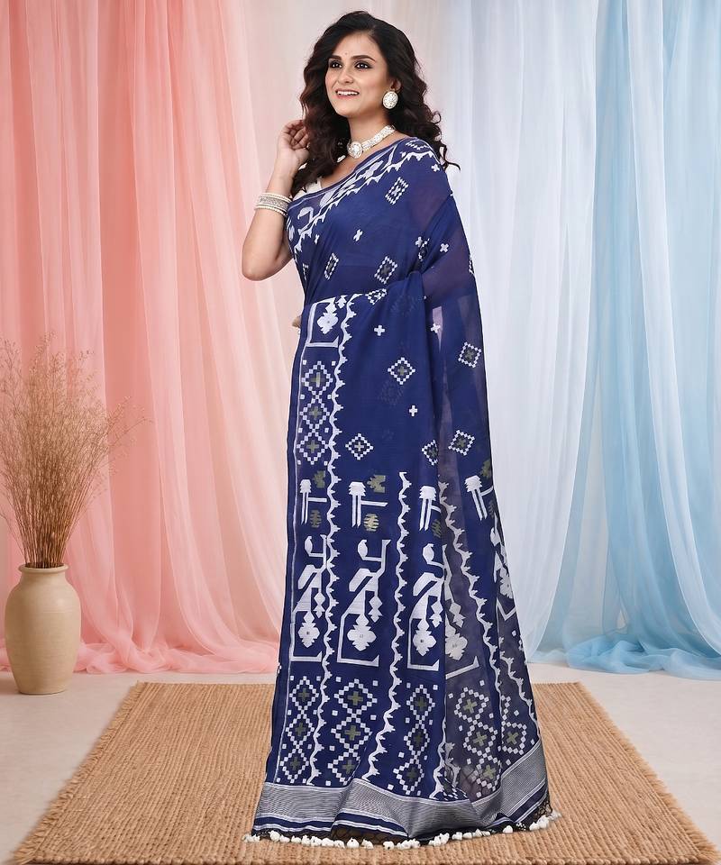 navy blue cotton blend saree with traditional woven patterns and tassel border