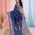 navy blue cotton blend saree with traditional woven patterns and tassel border