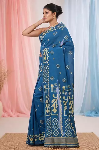 sapphire blue cotton blend saree with traditional woven patterns and tassel border