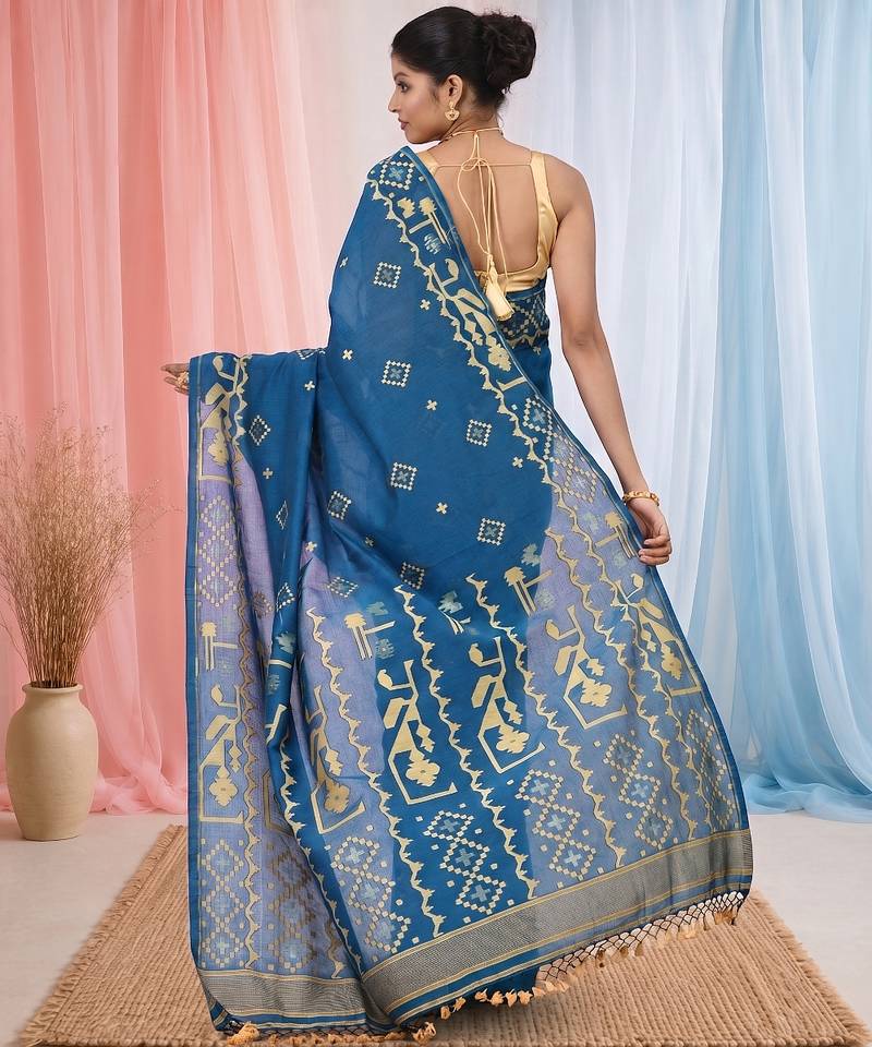 sapphire blue cotton blend saree with traditional woven patterns and tassel border