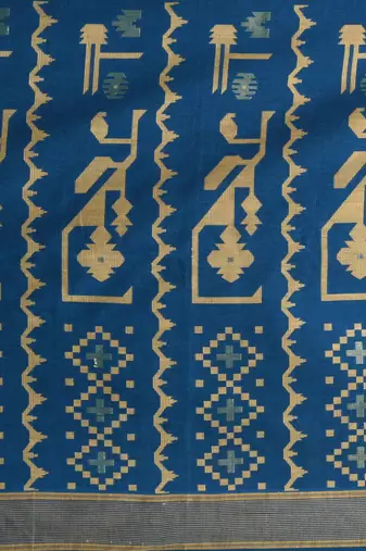 sapphire blue cotton blend saree with traditional woven patterns and tassel border