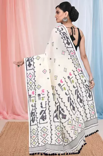 off white cotton blend saree with traditional woven patterns and tassel border