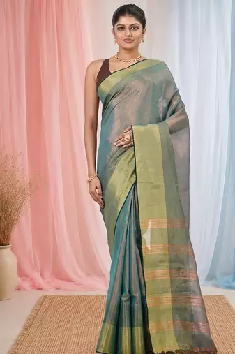 Elegant teal tissue saree with contrasting golden border