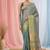 Elegant teal tissue saree with contrasting golden border