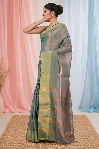 Elegant teal tissue saree with contrasting golden border