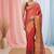Elegant red tissue saree with contrasting golden border