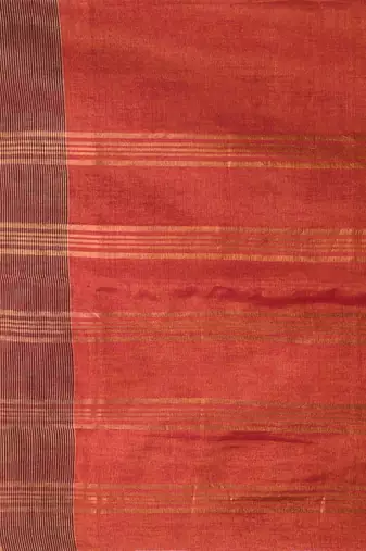 Elegant red tissue saree with contrasting golden border