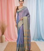 Elegant blue tissue saree with contrasting golden border