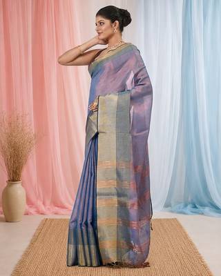 Elegant blue tissue saree with contrasting golden border 2