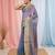Elegant blue tissue saree with contrasting golden border