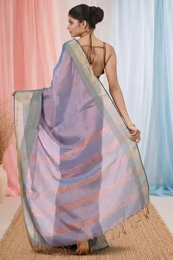 Elegant blue tissue saree with contrasting golden border