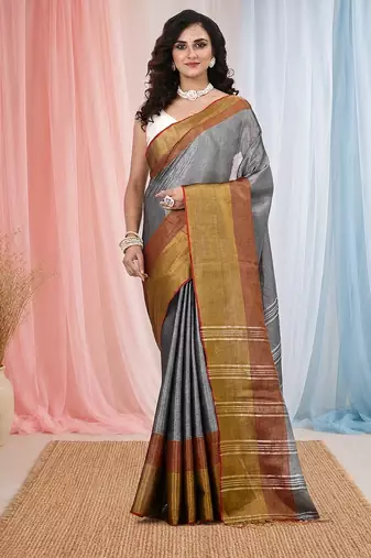 Elegant grey tissue saree with contrasting golden border
