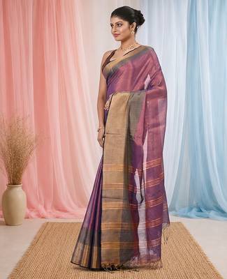 Elegant purple tissue saree with contrasting golden border 2