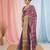 Elegant purple tissue saree with contrasting golden border
