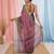 Elegant purple tissue saree with contrasting golden border