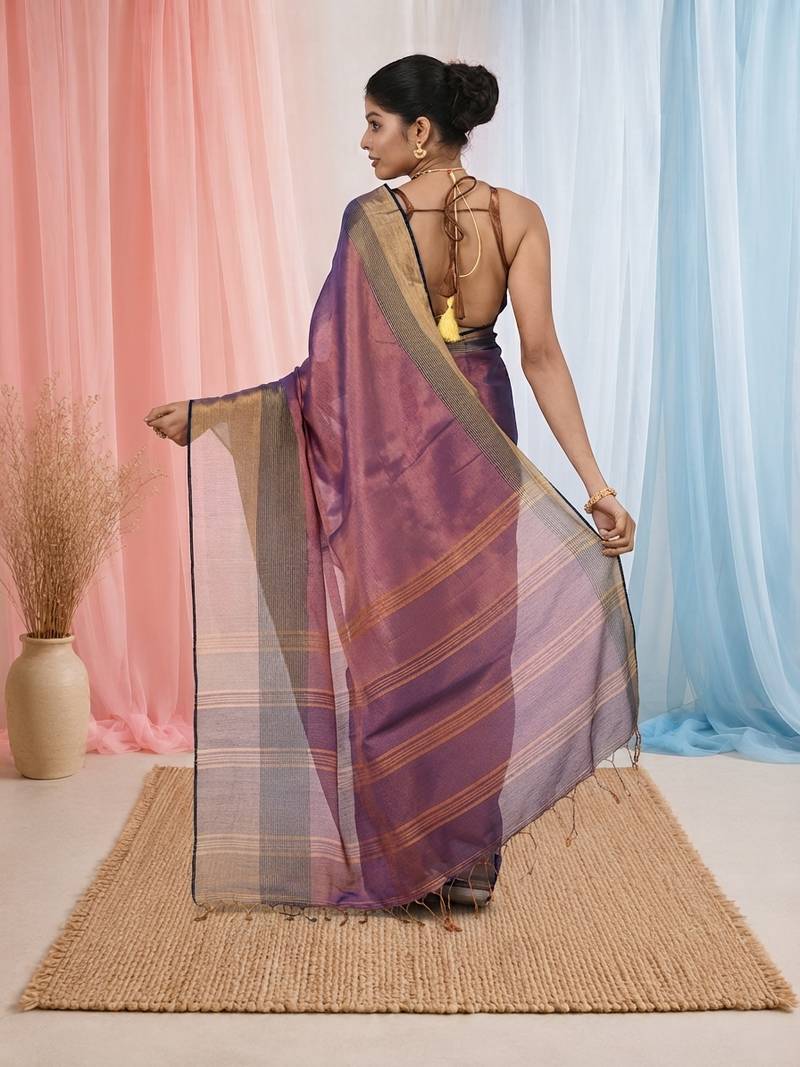 Elegant purple tissue saree with contrasting golden border