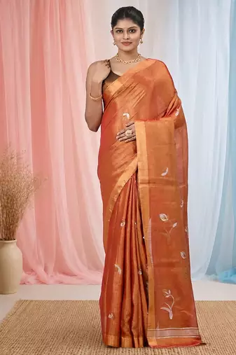 Orange tissue saree with ethnic motifs and golden border
