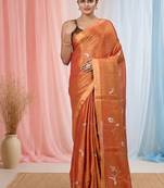 Orange tissue saree with ethnic motifs and golden border