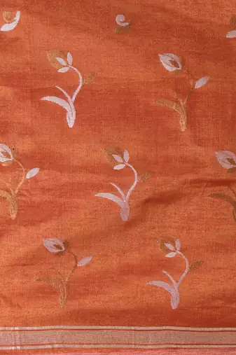 Orange tissue saree with ethnic motifs and golden border