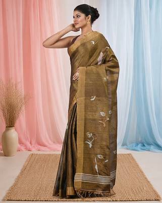 Metallic tissue saree with ethnic motifs and golden border 2