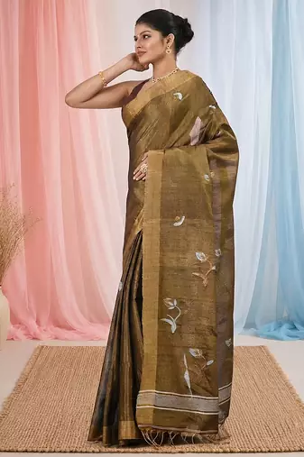 Metallic tissue saree with ethnic motifs and golden border