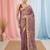Purple tissue saree with ethnic motifs and golden border