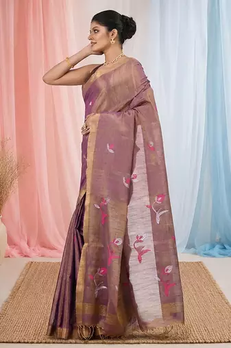Purple tissue saree with ethnic motifs and golden border