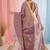 Purple tissue saree with ethnic motifs and golden border