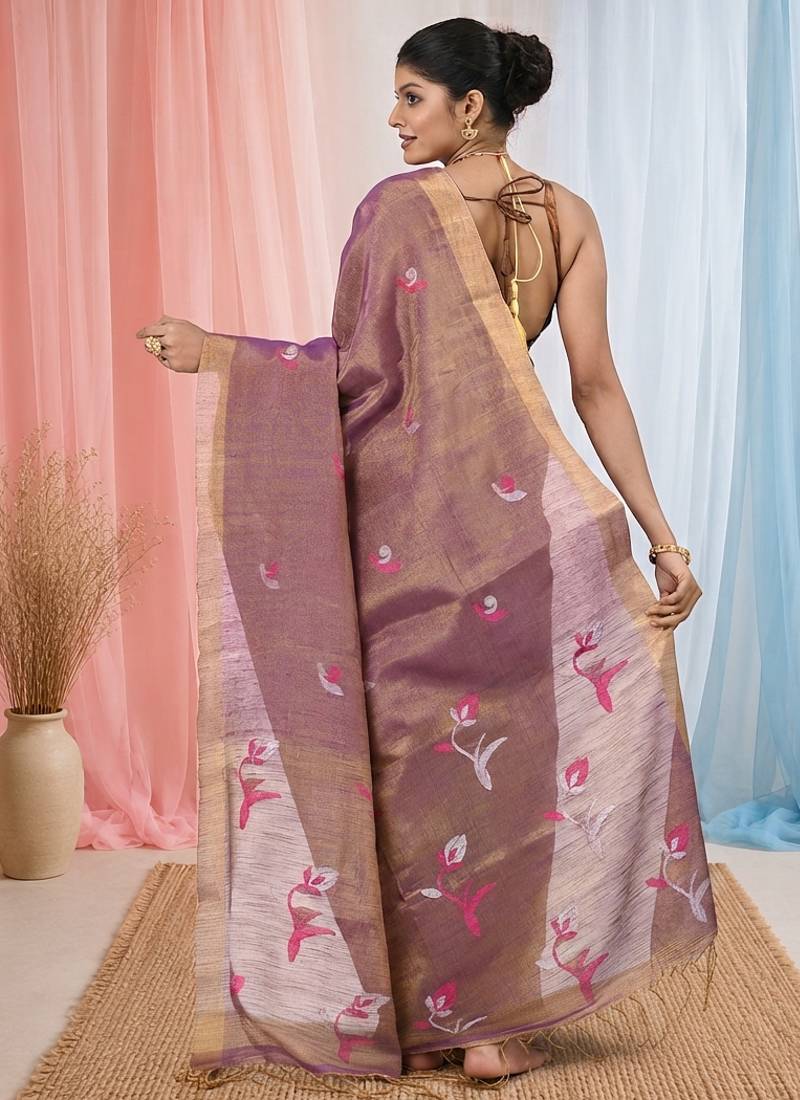 Purple tissue saree with ethnic motifs and golden border