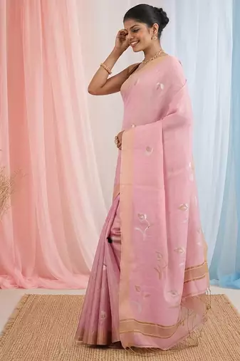 Baby pink tissue saree with ethnic motifs and golden border
