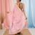 Baby pink tissue saree with ethnic motifs and golden border
