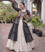 Garba outfits Black Laheriya Print Faux Georgette Kurti with Kora Cotton Lehenga Set